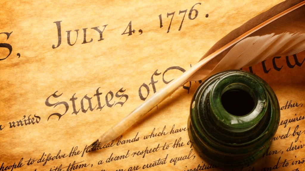 Quill and inkwell on top of Declaration of Independence